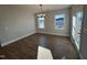 Bright dining room with hardwood floors and chandelier at 453 Edison Rail Ln, Knightdale, NC 27545