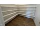 Walk-in pantry with ample shelving for storage at 453 Edison Rail Ln, Knightdale, NC 27545