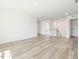 Upstairs bonus room with carpet, several windows, and ample natural light at 63 Whimbrel Ct, Lillington, NC 27546