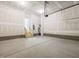 Large two car garage with block foundation and unfinished walls at 63 Whimbrel Ct, Lillington, NC 27546