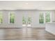 Bright, open-concept living and kitchen space with modern finishes and plenty of light at 63 Whimbrel Ct, Lillington, NC 27546