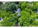 Bird's-eye view of house nestled in lush trees at 106 Alder Pl, Chapel Hill, NC 27517