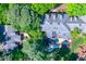 Overhead view of house, deck, and surrounding trees at 106 Alder Pl, Chapel Hill, NC 27517