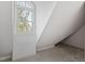 Charming bedroom with an arched window and spacious closet area at 106 Alder Pl, Chapel Hill, NC 27517