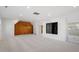 Bright bonus room with built-in shelving and carpeting at 106 Alder Pl, Chapel Hill, NC 27517
