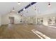 Spacious bonus room featuring hardwood floors and multiple windows at 106 Alder Pl, Chapel Hill, NC 27517