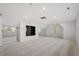 Versatile bonus room featuring a mirrored wall and abundant natural light at 106 Alder Pl, Chapel Hill, NC 27517