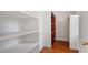 Large walk-in closet with built-in shelving at 106 Alder Pl, Chapel Hill, NC 27517