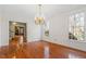 Bright dining room with hardwood floors and chandelier at 106 Alder Pl, Chapel Hill, NC 27517