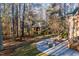 Brick home's front entrance with circular firepit at 106 Alder Pl, Chapel Hill, NC 27517