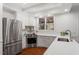 Modern kitchen with stainless steel appliances and white cabinets at 106 Alder Pl, Chapel Hill, NC 27517