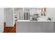Bright kitchen with island and ample cabinet storage at 106 Alder Pl, Chapel Hill, NC 27517