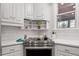 Modern kitchen corner with stainless steel stove and oven at 106 Alder Pl, Chapel Hill, NC 27517