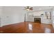 Living room features hardwood floors, fireplace and ceiling fan at 106 Alder Pl, Chapel Hill, NC 27517