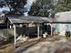 Backyard with storage shed and patio area at 403 E Railroad St, Spring Hope, NC 27882