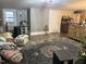 Living room with wood floors and large area rug at 403 E Railroad St, Spring Hope, NC 27882