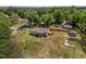 Charming single story home on large lot, features a small front porch and nice wooden back deck at 670 Mcadams Rd, Hillsborough, NC 27278