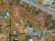 Bird's eye view shows the house on the large lot and its location near a thoroughfare at 670 Mcadams Rd, Hillsborough, NC 27278