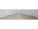 Bedroom showing neutral carpeting, with bright natural light, and white doors and trim at 107 Ethel Ln, Angier, NC 27501