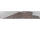 An up-close view of modern flooring, highlighting its texture and color variations at 107 Ethel Ln, Angier, NC 27501