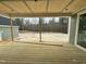 A wood porch looks out to the backyard at 136 Bar Code Ct, Wendell, NC 27591