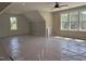 Spacious room with high ceilings, natural light, and neutral walls, ready for use as a bonus room at 136 Bar Code Ct, Wendell, NC 27591