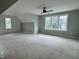 Bright and spacious bonus room featuring large windows that flood the space with natural light, perfect for any lifestyle at 136 Bar Code Ct, Wendell, NC 27591