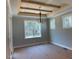 Bright dining room featuring a coffered ceiling and plenty of natural light at 136 Bar Code Ct, Wendell, NC 27591
