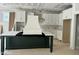 A kitchen with white cabinetry and a dark green island at 136 Bar Code Ct, Wendell, NC 27591