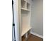 Bright mudroom area with built in cubbies and seating; perfect for storing coats, shoes, and backpacks at 136 Bar Code Ct, Wendell, NC 27591