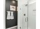 This bathroom has a frameless glass shower with white subway tile and a built-in niche at 2308 Beeblossom Pl, Fuquay Varina, NC 27526