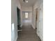 Bright hallway with doors to bedrooms and a bathroom at 2391 Englemann Dr Dr # 124, Apex, NC 27502