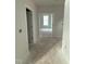 Interior hallway with white walls and doors leading to other rooms at 2397 Englemann Dr # 123, Apex, NC 27502