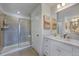 Elegant bathroom with a walk-in shower and double vanity at 26 Shay St, Angier, NC 27501