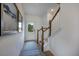 Bright and airy entryway with hardwood floors and staircase at 26 Shay St, Angier, NC 27501