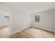 A large bedroom with a window and a view at 320 W Orange St, Hillsborough, NC 27278