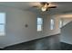 Bright, open-concept living area with sleek ceiling fan and natural light at 346 Tormore, Homesite 125, Sanford, NC 27330