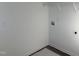 A simple storage area features painted walls and minimalist shelving at 346 Tormore, Homesite 125, Sanford, NC 27330