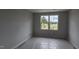 Bright bedroom with a large window with outside view at 3936 Well Fleet Drive, Fuquay Varina, NC 27526