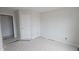 Bedroom featuring neutral walls and a door leading to another room at 3936 Well Fleet Drive, Fuquay Varina, NC 27526