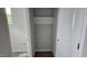 Walk-in closet features ample storage with a shelf and white trim at 3936 Well Fleet Drive, Fuquay Varina, NC 27526