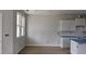 New kitchen with white cabinets and a window at 3936 Well Fleet Drive, Fuquay Varina, NC 27526