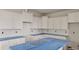 New kitchen features white cabinets, subway tile, and center island at 3936 Well Fleet Drive, Fuquay Varina, NC 27526