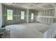 Spacious living room featuring large windows for natural light and new construction walls at 71 Slocum Dr, Wendell, NC 27591