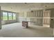 Spacious unfinished living room with natural light ready for finishes; a blank canvas to customize and decorate at 71 Slocum Dr, Wendell, NC 27591