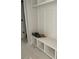 The mud room includes white cubbies and a bench, offering stylish organization at 71 Slocum Dr, Wendell, NC 27591