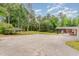 Large backyard featuring a covered area and plenty of parking at 129 Jeffress Dr, Louisburg, NC 27549