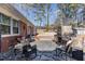 Flagstone patio with built-in grill and fireplace at 129 Jeffress Dr, Louisburg, NC 27549