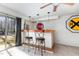 Basement bar area with barstool seating and a vintage 
