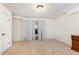 Bright bedroom with neutral walls and carpet flooring at 129 Jeffress Dr, Louisburg, NC 27549